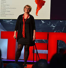 women presenting with her arms and hands to her side, naturally