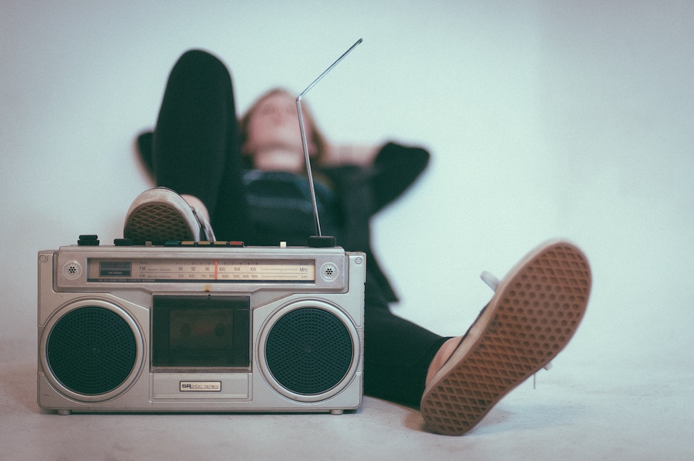 Listening to music is a form of relaxation, which can calm pre-presentation anxiety and help you stay grounded.