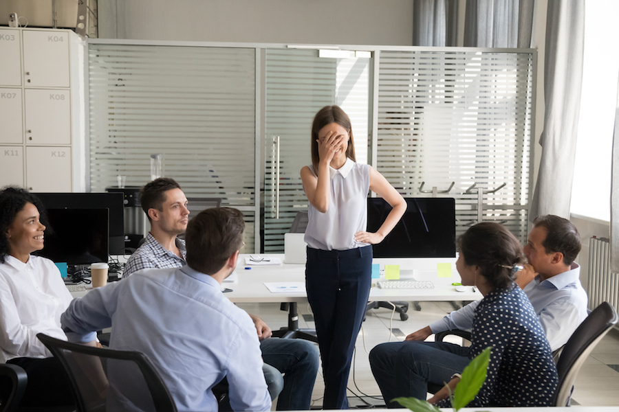 Women delivering a speech seeming to be shy—but introversion and shyness need not be an impediment to confident speech delivery.